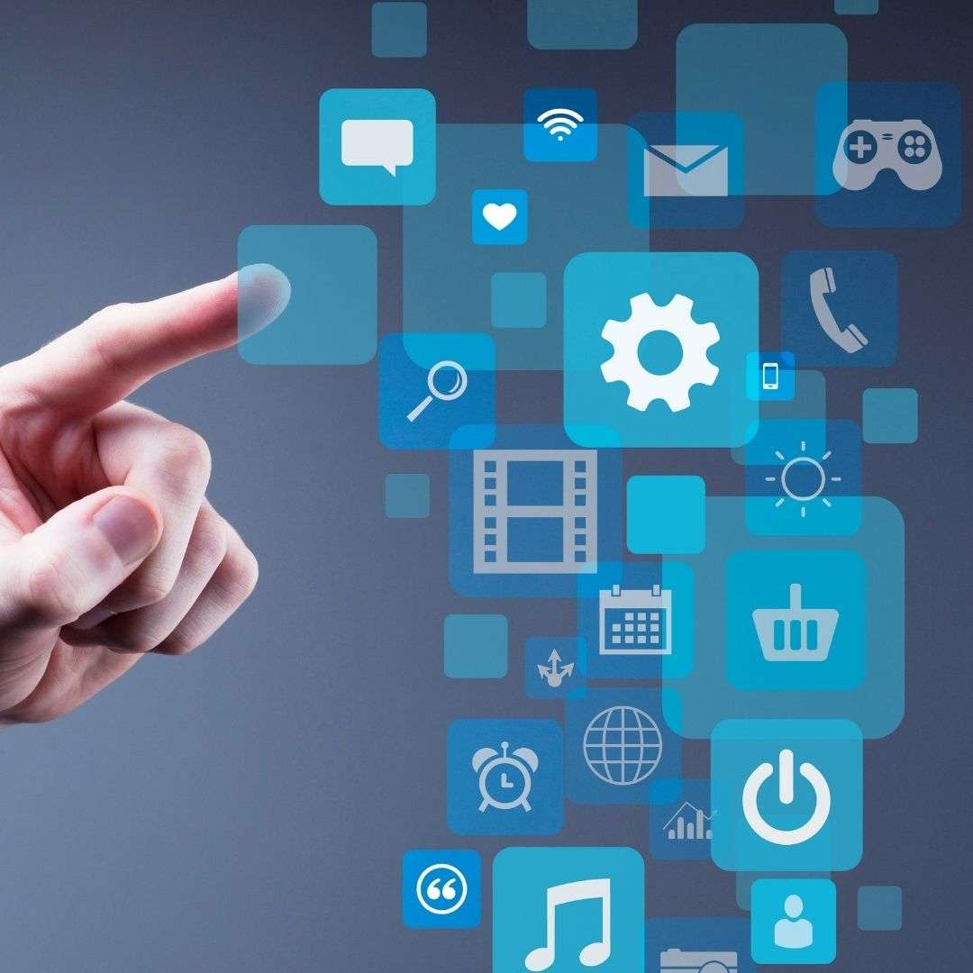 Hand interacting with digital interface featuring various application icons, illustrating change management tools and strategies.